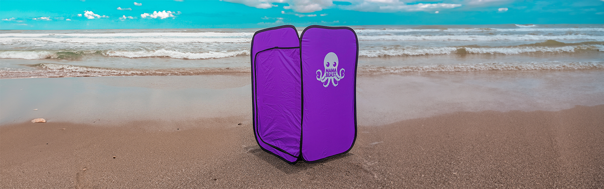 Mama Beast pop-up tent fully open on the sand